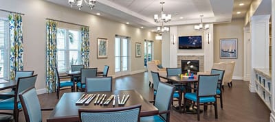 Bright and inviting common area with decorated tables