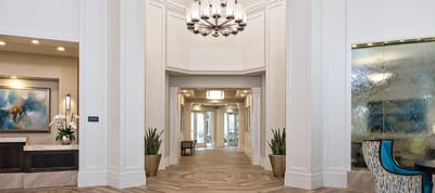 Interior view of a modern lobby area with light fixtures