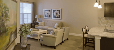 Cozy living room area of a resident's suite