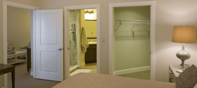 Interior view of a resident's room with bathroom