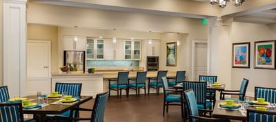 Bright dining room with tables set