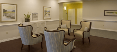 Cozy common area with seating and artwork