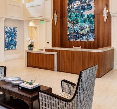 Bright lobby area with seating and artwork