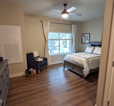 Bright and welcoming resident room with a window