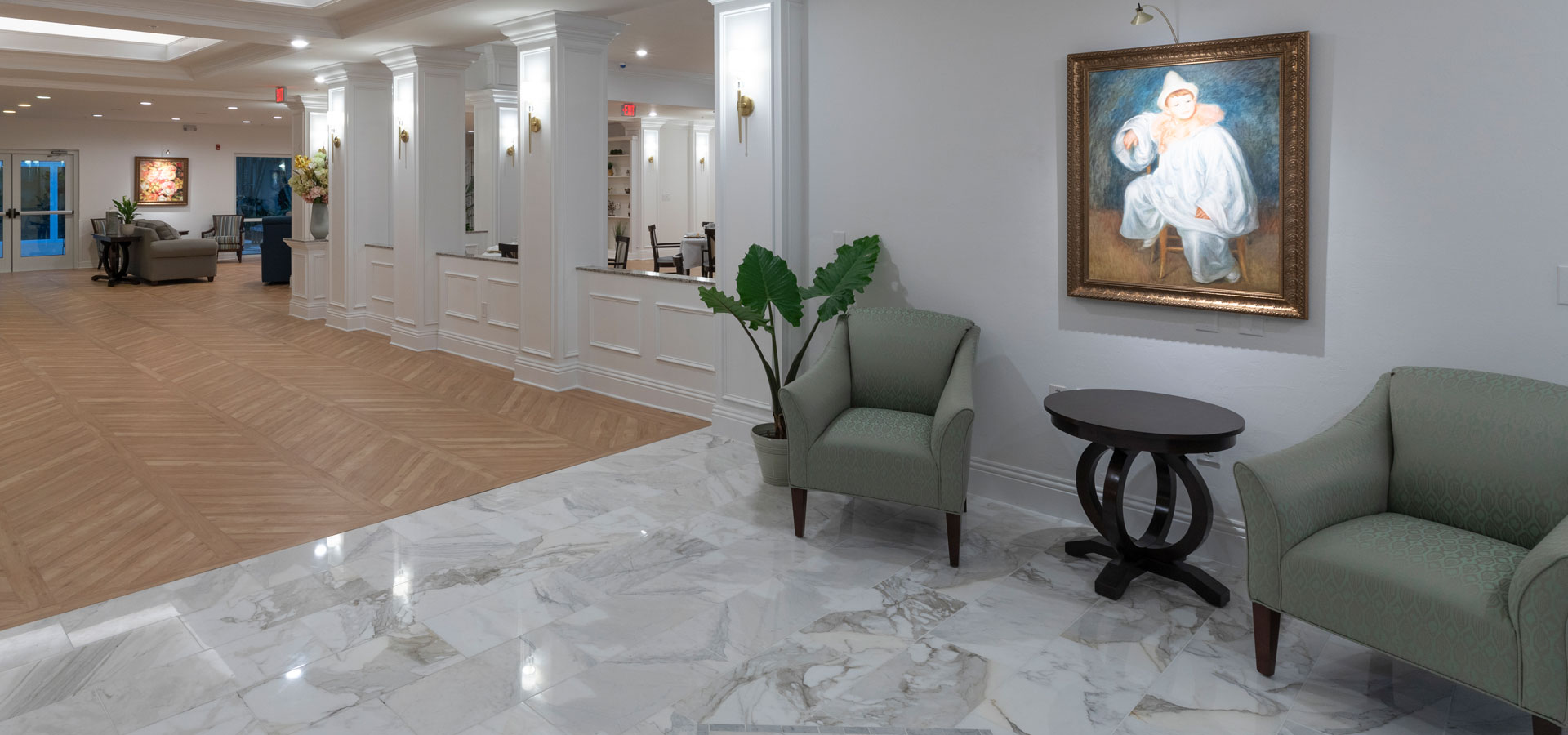 Interior view of a common area with seating and artwork