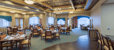 Dining area with tables and chairs in an elegant setting