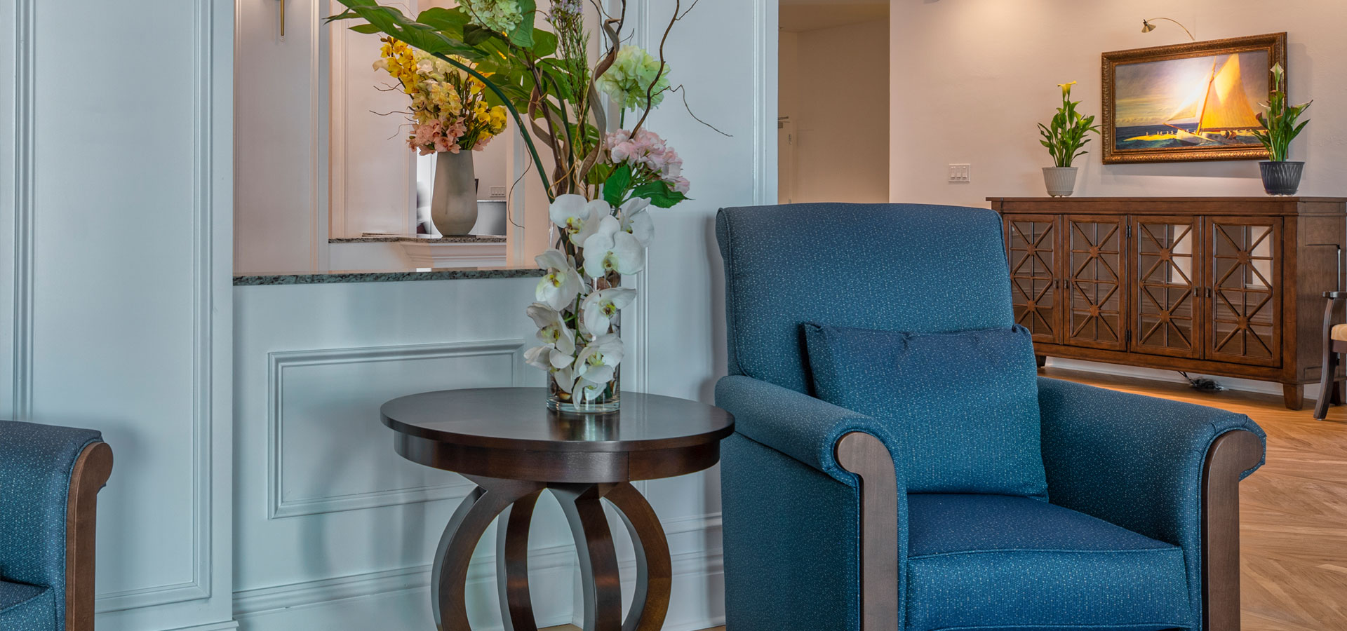 Interior view of a cozy sitting area with flowers