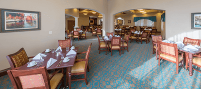 Bright dining room with neatly set tables