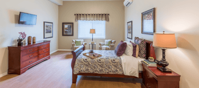 Cozy residential room with seating area and natural light
