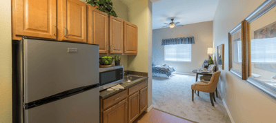 Cozy kitchen area leading to a resident room