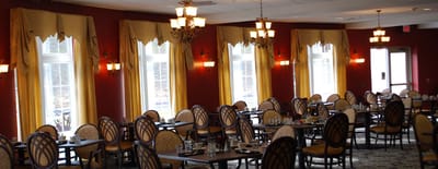 Elegant dining room with decorative furnishings and ample lighting