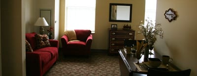 Cozy interior of a resident's room with furniture