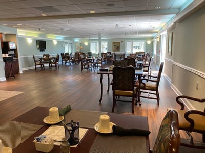 Spacious dining area with tables and chairs