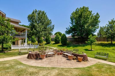 Beautiful outdoor seating area surrounded by greenery