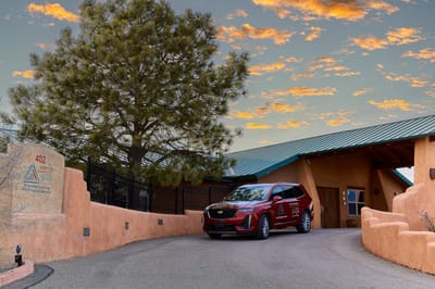 Entrance of Sierra Vista Retirement Community with a vehicle