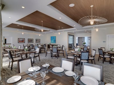 Dining area with well-set tables and modern decor
