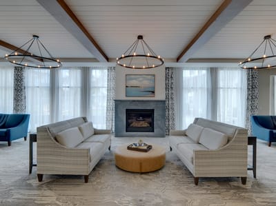 Comfortable common area with seating and fireplace