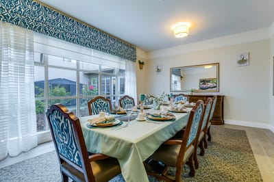 Well-set dining room with elegant table settings