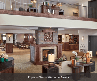 Bright foyer with welcoming decor and seating
