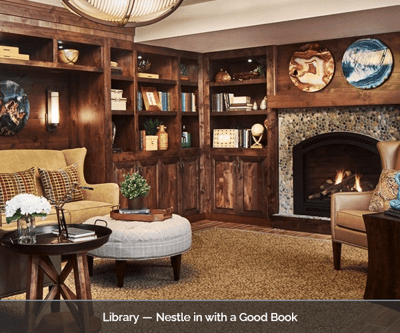 Cozy library area with books and fireplace