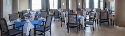 Dining room set up with tables and chairs