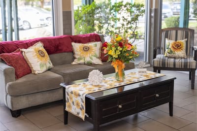 Cozy common area with floral decor and furniture