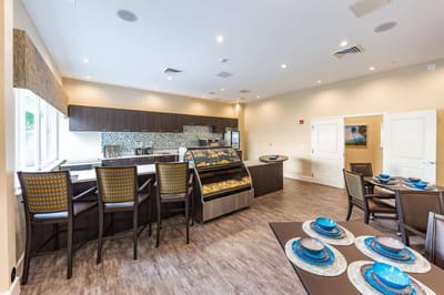 Bright dining area with modern decor and food display