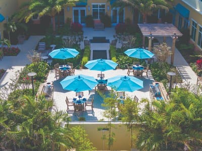 Aerial view of outdoor seating area with umbrellas