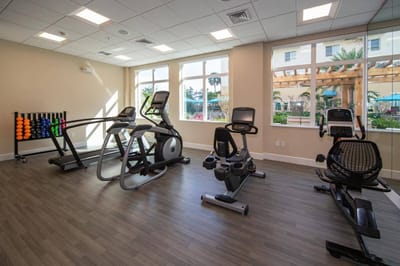 Well-equipped fitness area in a senior living facility