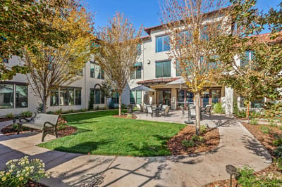 Outdoor courtyard with seating and landscaping