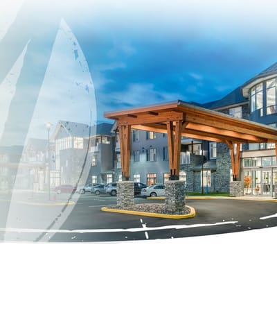 Exterior view of Meadowcrest facility entrance at dusk