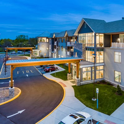 Exterior view of the Meadowcrest facility during twilight