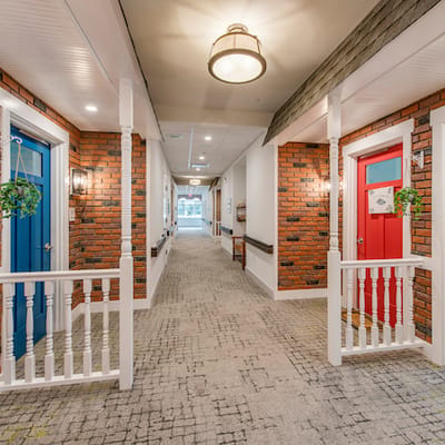 Bright interior hallway with colorful doors and decor