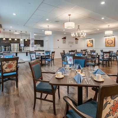 Dining area with tables set for a meal