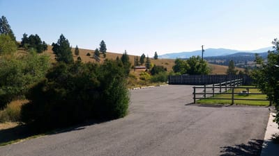 Scenic outdoor view with road and hills