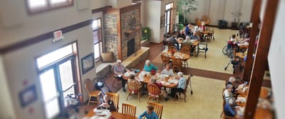 Residents enjoying a meal in the dining area.