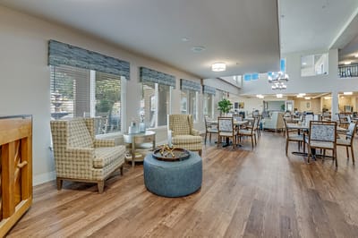 Dining area with seating and natural light