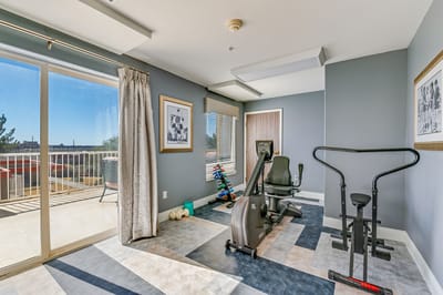 Fitness area with exercise equipment and natural light