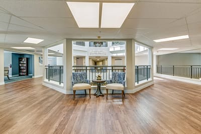 Well-lit common area with seating and decor