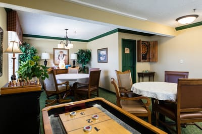 Interior common area with seating and game table