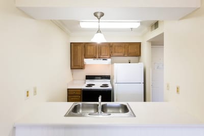 Bright, functional kitchen in a living space.