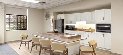 Bright interior common area with a kitchen counter
