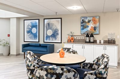 Common area with seating and decorative art.