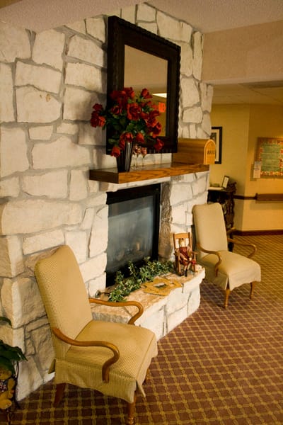 Cozy interior common area with a fireplace