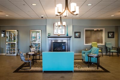 Lounge area with seating and a fireplace