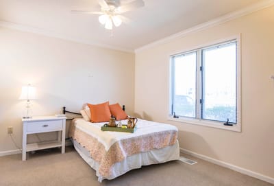 Cozy bedroom with a bed and window