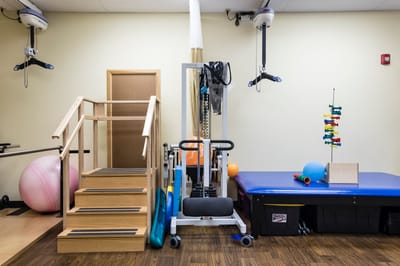 Physical therapy equipment in a facility interior.