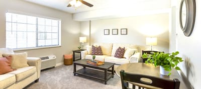 Cozy living room with comfortable seating and decor.