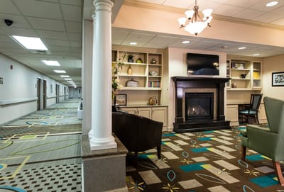 Interior common area with fireplace and seating