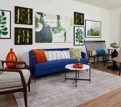 Colorful lounge area with seating and artwork